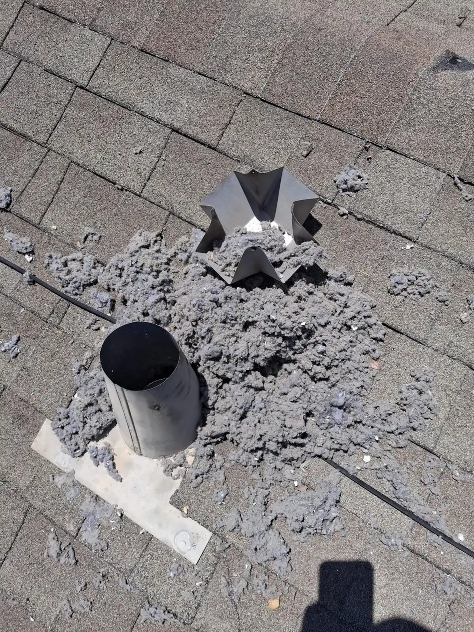 Dryer vent lint cleared from a rooftop vent in Dallas–Fort Worth
