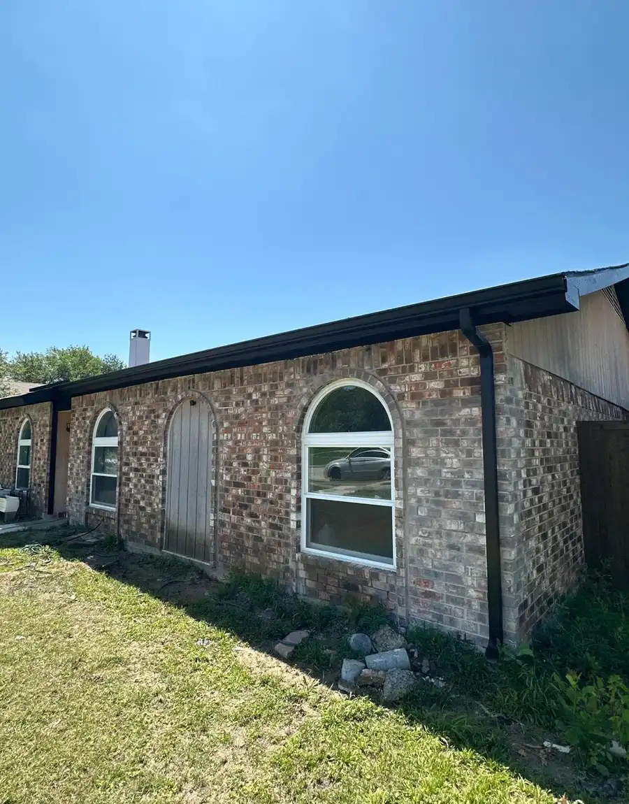 New seamless gutter installation on a Dallas–Fort Worth home