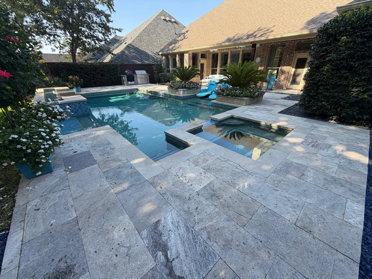 Completed travertine paver pool deck Dallas Fort Worth TX