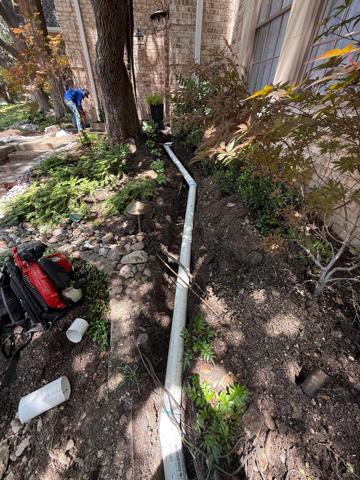 Backyard drainage installation Dallas TX