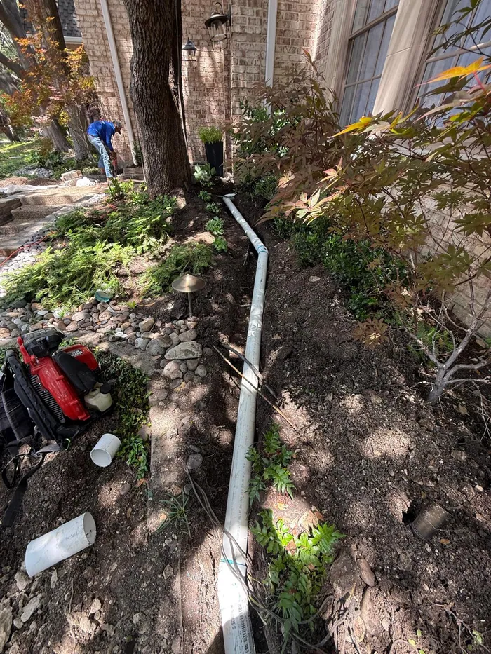 Backyard drainage installation Dallas TX