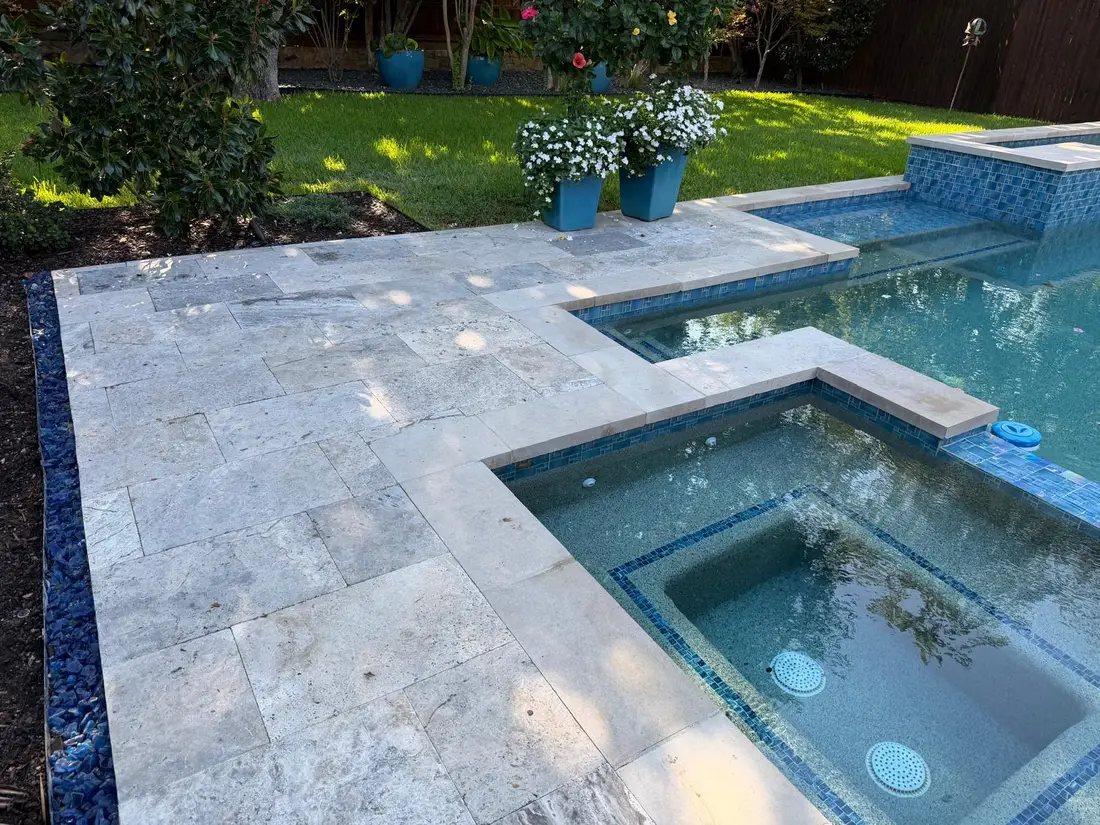 Travertine pool deck with landscaping Dallas Fort Worth TX
